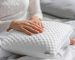 close-up-image-woman-touching-memory-foam-pillow-banner-with-text-space_1007204-41653 (1)